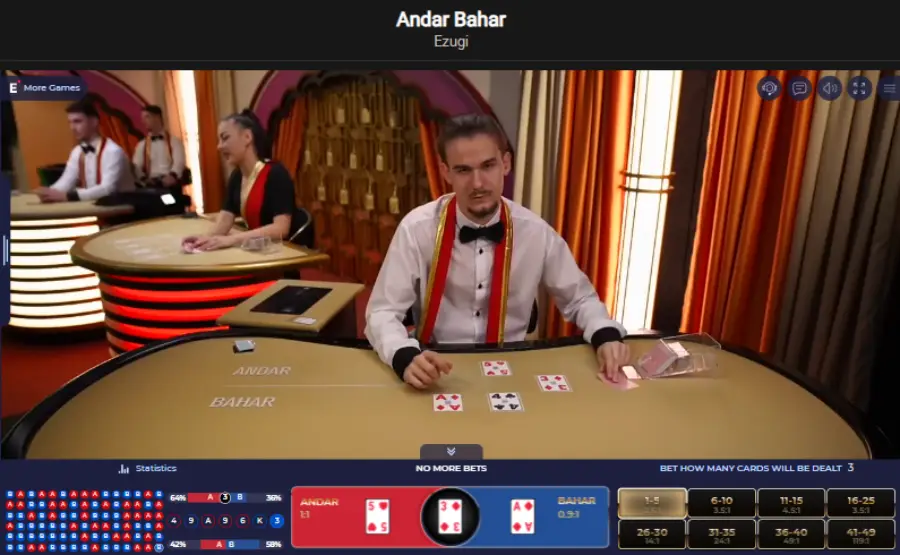 A live dealer hosting an Andar Bahar game by Ezugi, with a luxurious gaming table setup featuring the Andar and Bahar betting options clearly marked. 